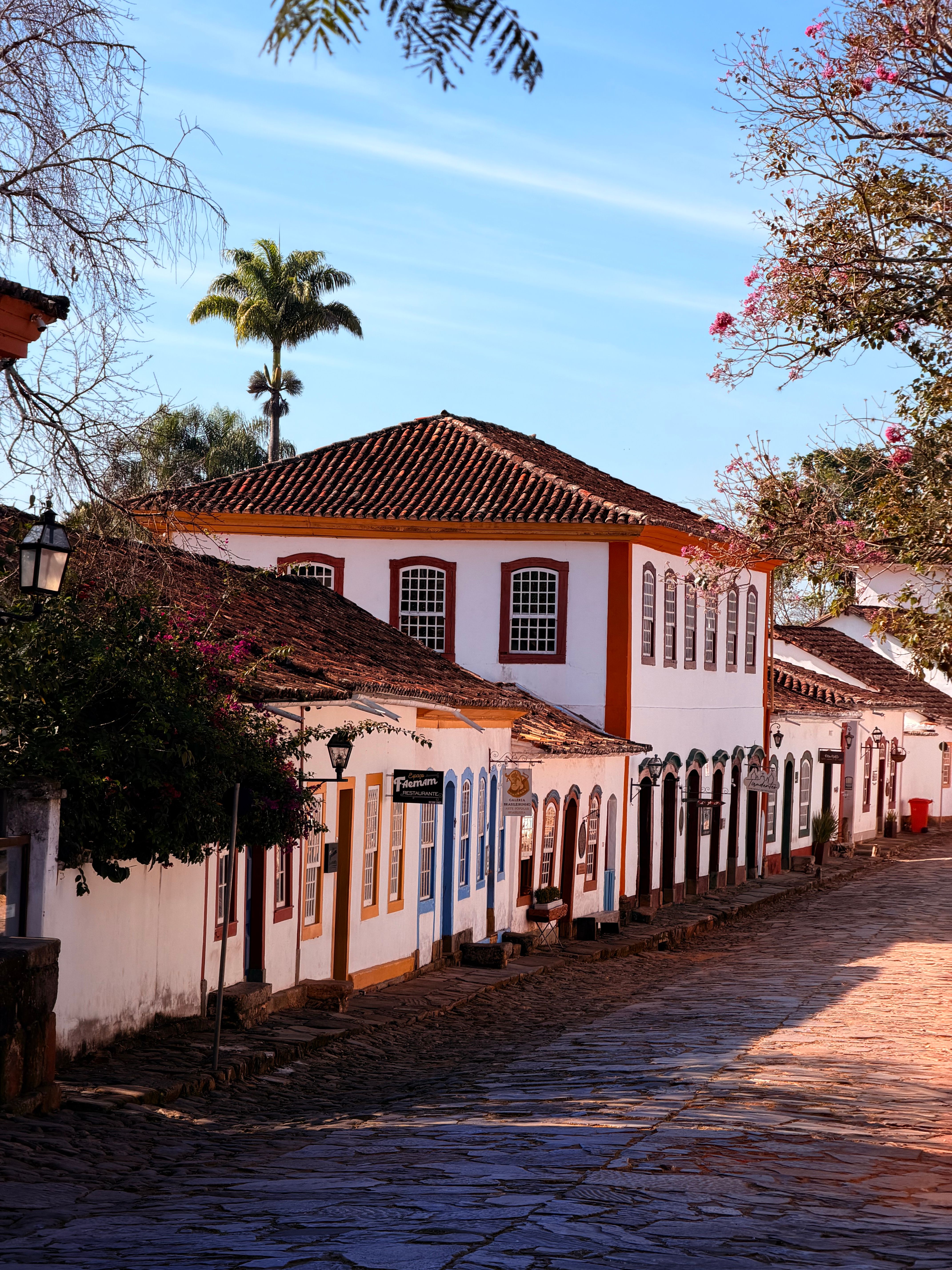 Cobblestone street lined with restaurants in Pirenópolis